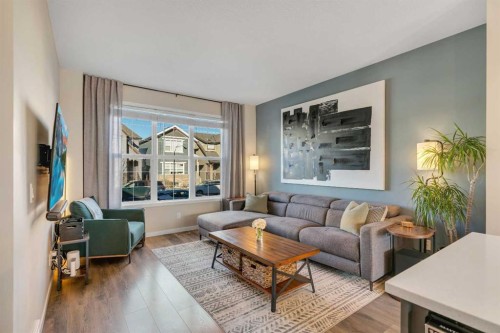 84 Masters Heights Se, Calgary, AB - Indoor Photo Showing Living Room