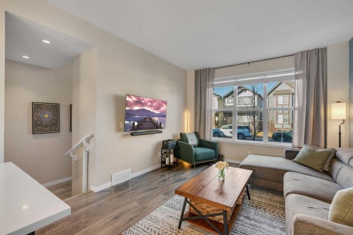 84 Masters Heights Se, Calgary, AB - Indoor Photo Showing Living Room