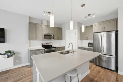 71 Sage Bluff Heights Nw, Calgary, AB - Indoor Photo Showing Kitchen With Stainless Steel Kitchen With Double Sink With Upgraded Kitchen