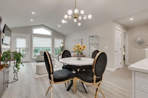 185 Riverwood Crescent, Diamond Valley, AB - Indoor Photo Showing Living Room
