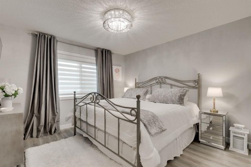 185 Riverwood Crescent, Diamond Valley, AB - Indoor Photo Showing Living Room