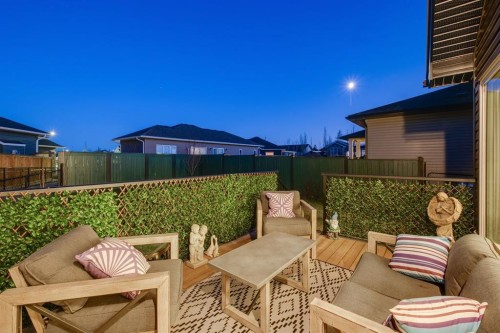 185 Riverwood Crescent, Diamond Valley, AB - Indoor Photo Showing Garage