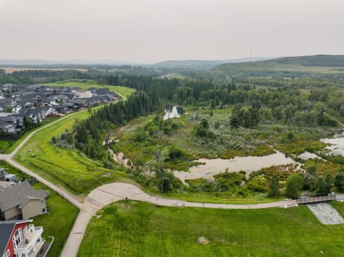 185 Riverwood Crescent, Diamond Valley, AB - Outdoor With Deck Patio Veranda