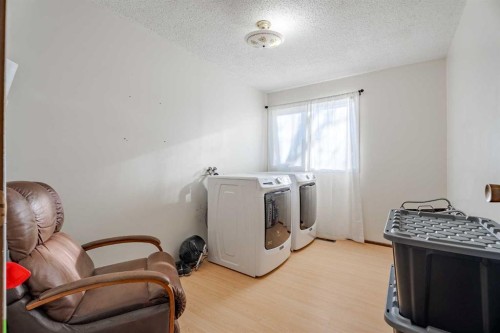 5108 52 Avenue, Stavely, AB - Indoor Photo Showing Laundry Room