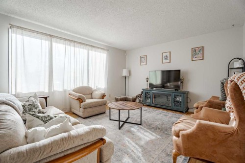 5108 52 Avenue, Stavely, AB - Indoor Photo Showing Living Room