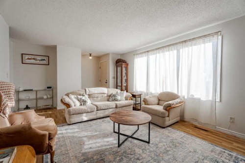 5108 52 Avenue, Stavely, AB - Indoor Photo Showing Living Room