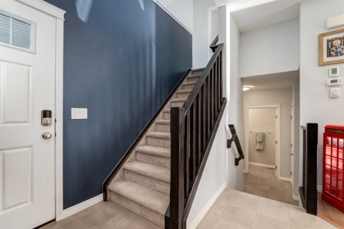 36 Sundown Common, Cochrane, AB - Indoor Photo Showing Other Room