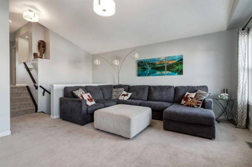 36 Sundown Common, Cochrane, AB - Indoor Photo Showing Living Room