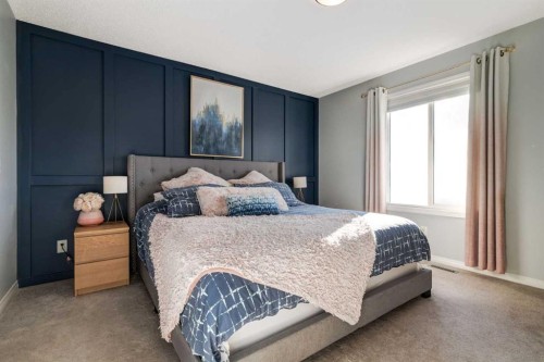 36 Sundown Common, Cochrane, AB - Indoor Photo Showing Bedroom