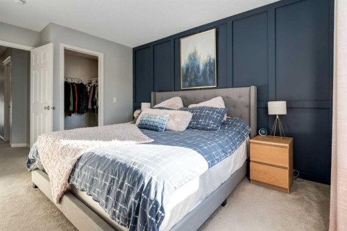 36 Sundown Common, Cochrane, AB - Indoor Photo Showing Bedroom