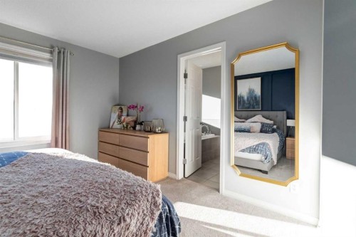 36 Sundown Common, Cochrane, AB - Indoor Photo Showing Bedroom