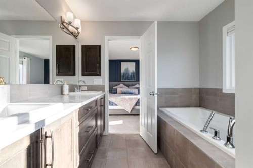 36 Sundown Common, Cochrane, AB - Indoor Photo Showing Bathroom