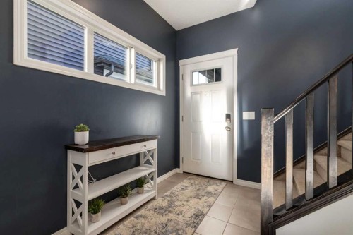 36 Sundown Common, Cochrane, AB - Indoor Photo Showing Other Room