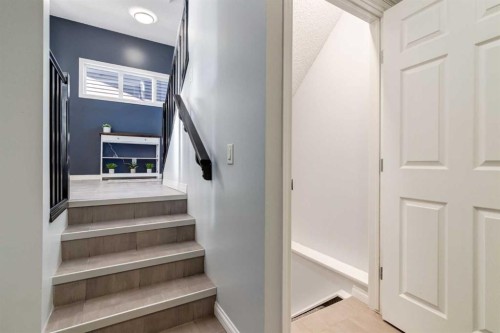 36 Sundown Common, Cochrane, AB - Indoor Photo Showing Other Room