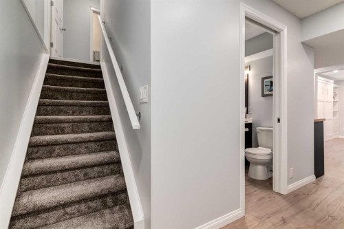 36 Sundown Common, Cochrane, AB - Indoor Photo Showing Other Room