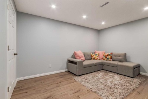 36 Sundown Common, Cochrane, AB - Indoor Photo Showing Other Room