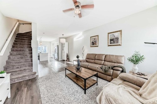 2306 Jumping Pound Common, Cochrane, AB - Indoor Photo Showing Living Room
