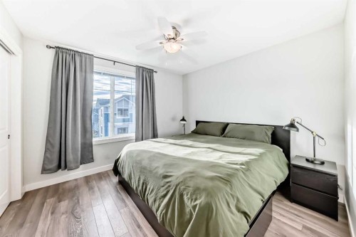 2306 Jumping Pound Common, Cochrane, AB - Indoor Photo Showing Bedroom