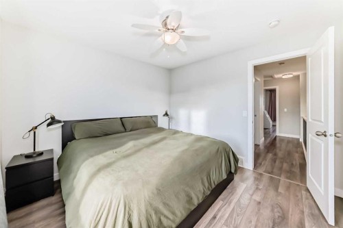 2306 Jumping Pound Common, Cochrane, AB - Indoor Photo Showing Bedroom