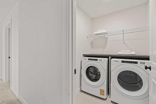 47 Setonridge Park Se, Calgary, AB - Indoor Photo Showing Laundry Room