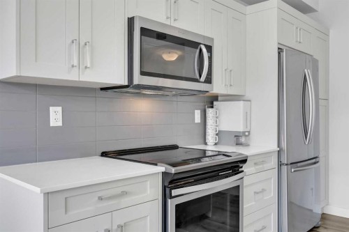 305-35 Walgrove Se, Calgary, AB - Indoor Photo Showing Kitchen With Upgraded Kitchen
