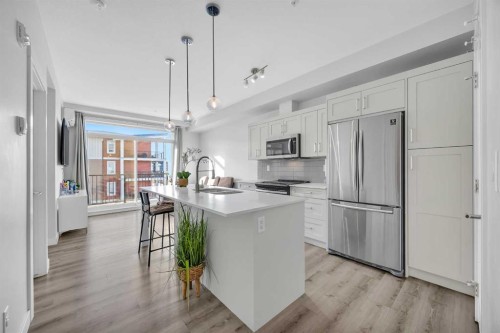 305-35 Walgrove Se, Calgary, AB - Indoor Photo Showing Kitchen With Upgraded Kitchen