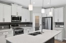 130 Evanscrest Terrace Nw, Calgary, AB  - Indoor Photo Showing Kitchen With Double Sink With Upgraded Kitchen 