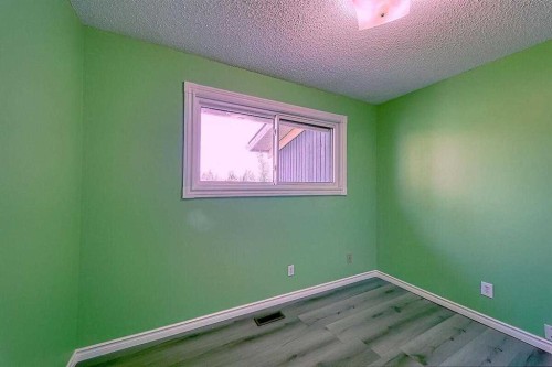 206-2200 Woodview Drive Sw, Calgary, AB - Indoor Photo Showing Other Room