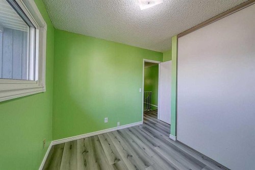 206-2200 Woodview Drive Sw, Calgary, AB - Indoor Photo Showing Other Room