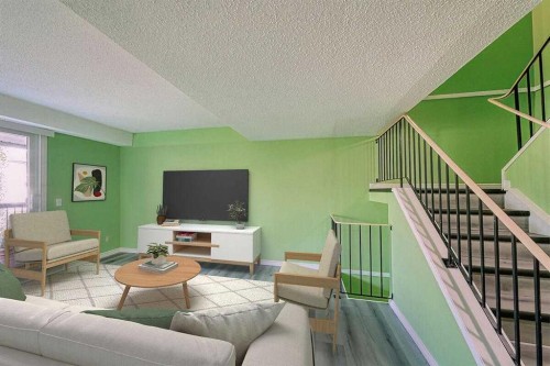 206-2200 Woodview Drive Sw, Calgary, AB - Indoor Photo Showing Living Room