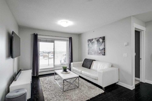 1405-240 Skyview Ranch Road Ne, Calgary, AB - Indoor Photo Showing Living Room