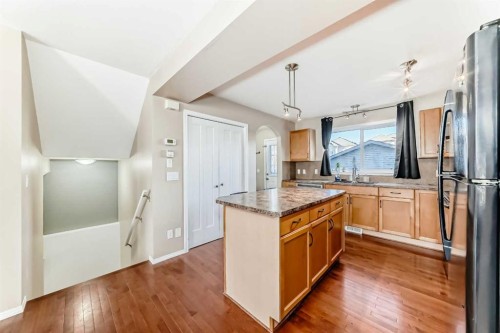 47 Bridlecrest Road Sw, Calgary, AB - Indoor Photo Showing Kitchen With Double Sink