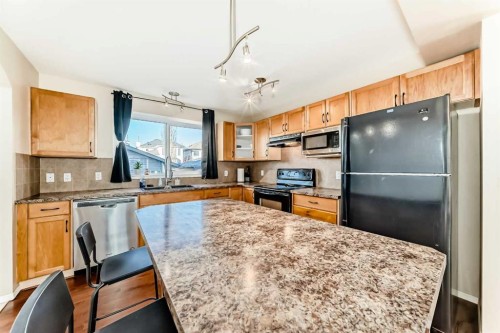 47 Bridlecrest Road Sw, Calgary, AB - Indoor Photo Showing Kitchen