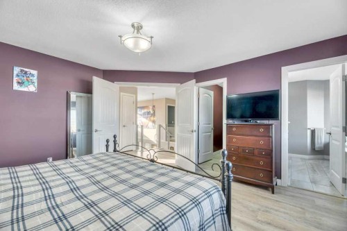 44 Douglas Shore Close Se, Calgary, AB - Indoor Photo Showing Bedroom