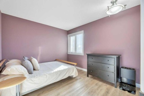 44 Douglas Shore Close Se, Calgary, AB - Indoor Photo Showing Bedroom