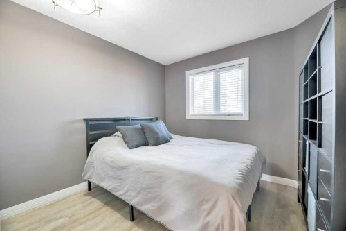 44 Douglas Shore Close Se, Calgary, AB - Indoor Photo Showing Bedroom