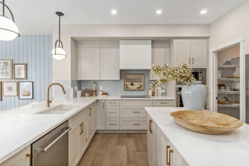 80 Magnolia Green Se, Calgary, AB - Indoor Photo Showing Kitchen With Double Sink With Upgraded Kitchen