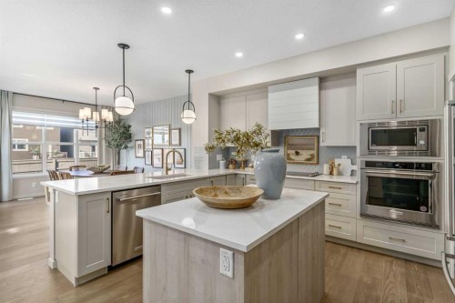 80 Magnolia Green Se, Calgary, AB - Indoor Photo Showing Kitchen With Stainless Steel Kitchen With Upgraded Kitchen