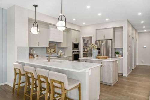 80 Magnolia Green Se, Calgary, AB - Indoor Photo Showing Kitchen With Stainless Steel Kitchen With Upgraded Kitchen