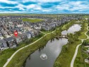 225 Kingsmere Cove Se, Airdrie, AB  - Outdoor With Body Of Water With View 