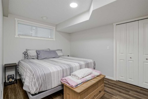 225 Kingsmere Cove Se, Airdrie, AB - Indoor Photo Showing Bedroom
