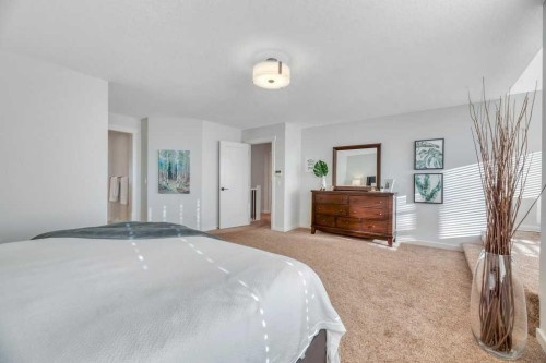 225 Discovery Ridge Way Sw, Calgary, AB - Indoor Photo Showing Bedroom