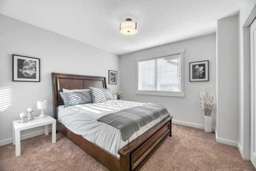 225 Discovery Ridge Way Sw, Calgary, AB - Indoor Photo Showing Bedroom