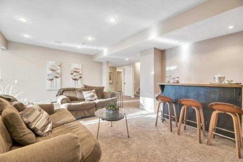 225 Discovery Ridge Way Sw, Calgary, AB - Indoor Photo Showing Living Room