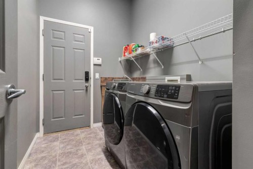 10 Chapala Road Se, Calgary, AB - Indoor Photo Showing Laundry Room