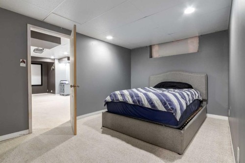 10 Chapala Road Se, Calgary, AB - Indoor Photo Showing Bedroom