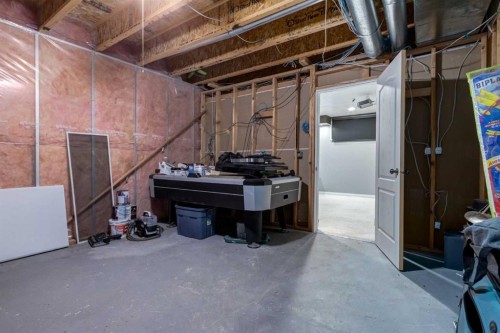 10 Chapala Road Se, Calgary, AB - Indoor Photo Showing Basement