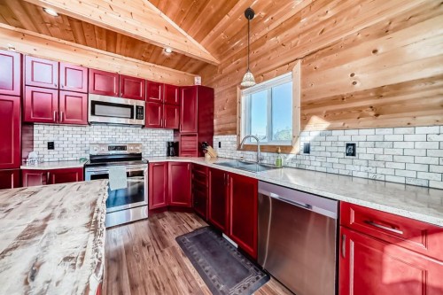 12 Destini Drive, White Sands, AB - Indoor Photo Showing Kitchen With Stainless Steel Kitchen With Double Sink