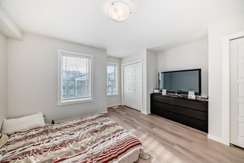 406-474 Seton Circle Se, Calgary, AB - Indoor Photo Showing Bedroom