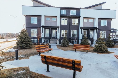 406-474 Seton Circle Se, Calgary, AB - Outdoor With Deck Patio Veranda With Facade